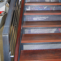 The custom metal/wood stair