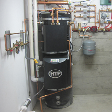 High-efficiency, solar hot water assisted boiler for DHW and radiant floor heating
