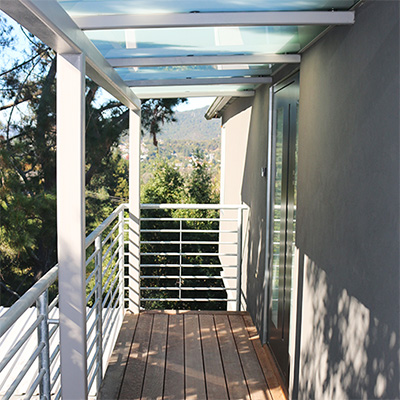 Entry Ipe deck, steel and glass canopy, Pirnar door