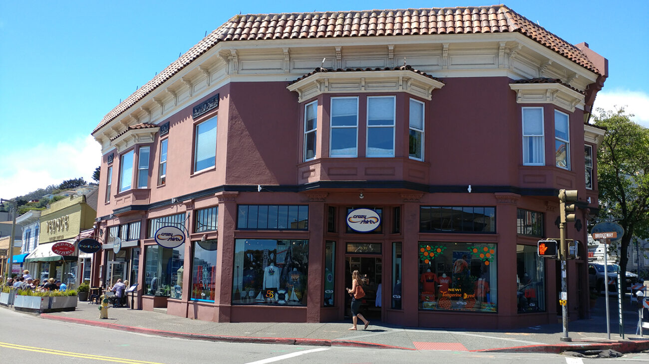 Exterior, remodeled café on far left